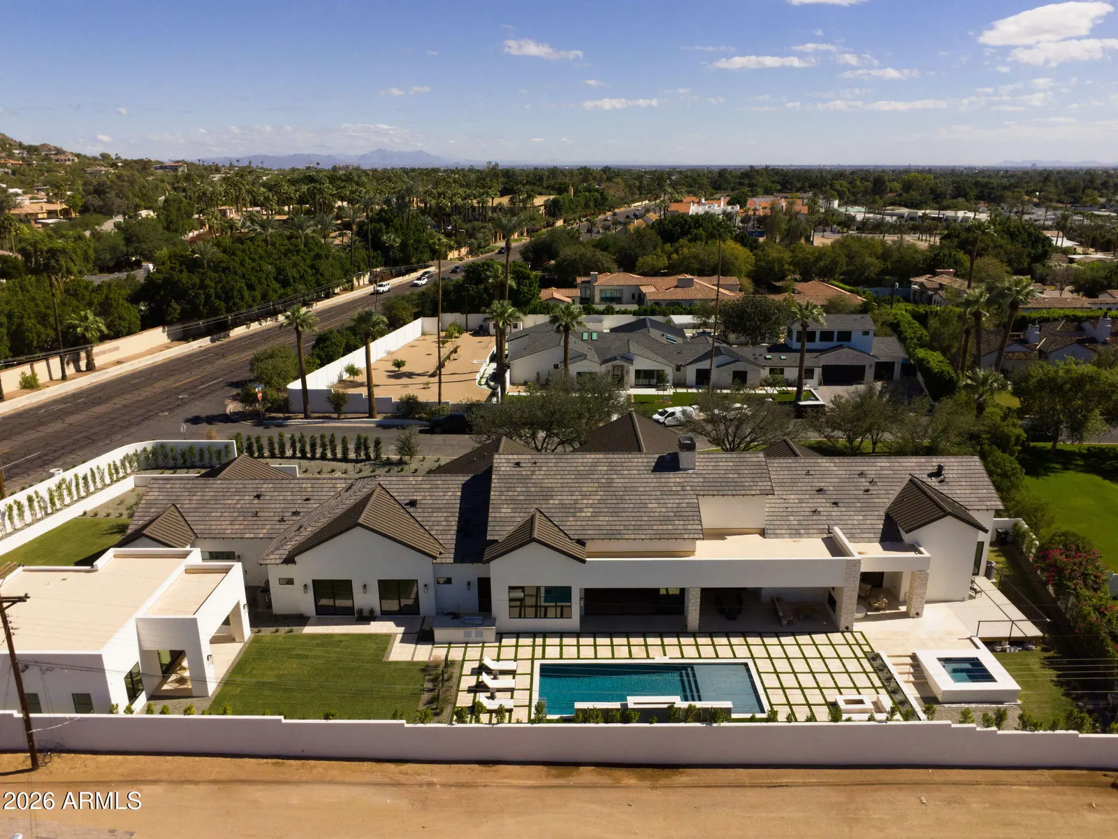 Aerial view of 4632 N Royal Palm Circle, its pool and the surrounding Arcadia neighborhood